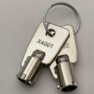 The X4001 and X4002 keys on a keychain together, with their key codes engraved on them